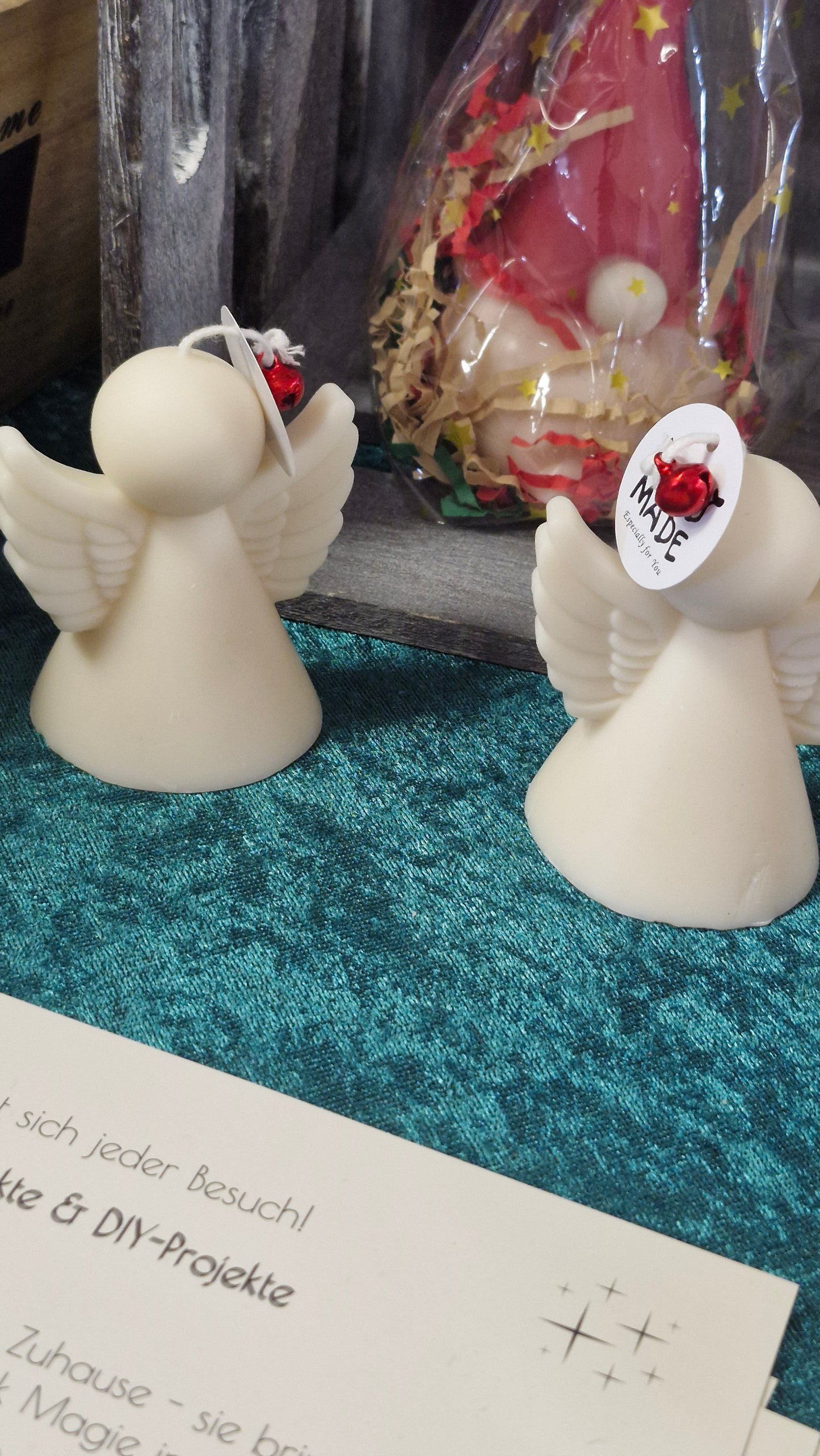 Engel und Handschuh Kerze im schlichten Design