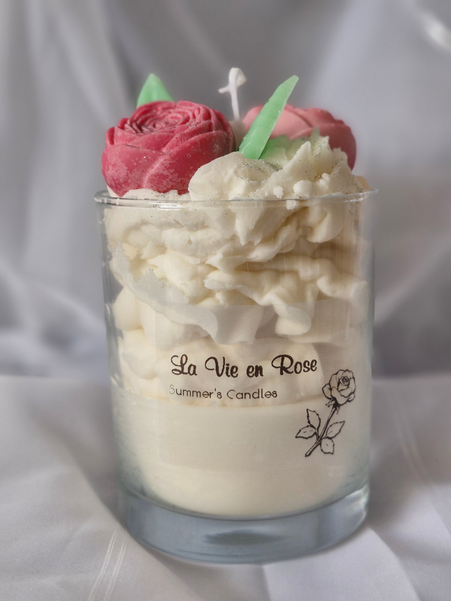 Blütenkerze im Glas