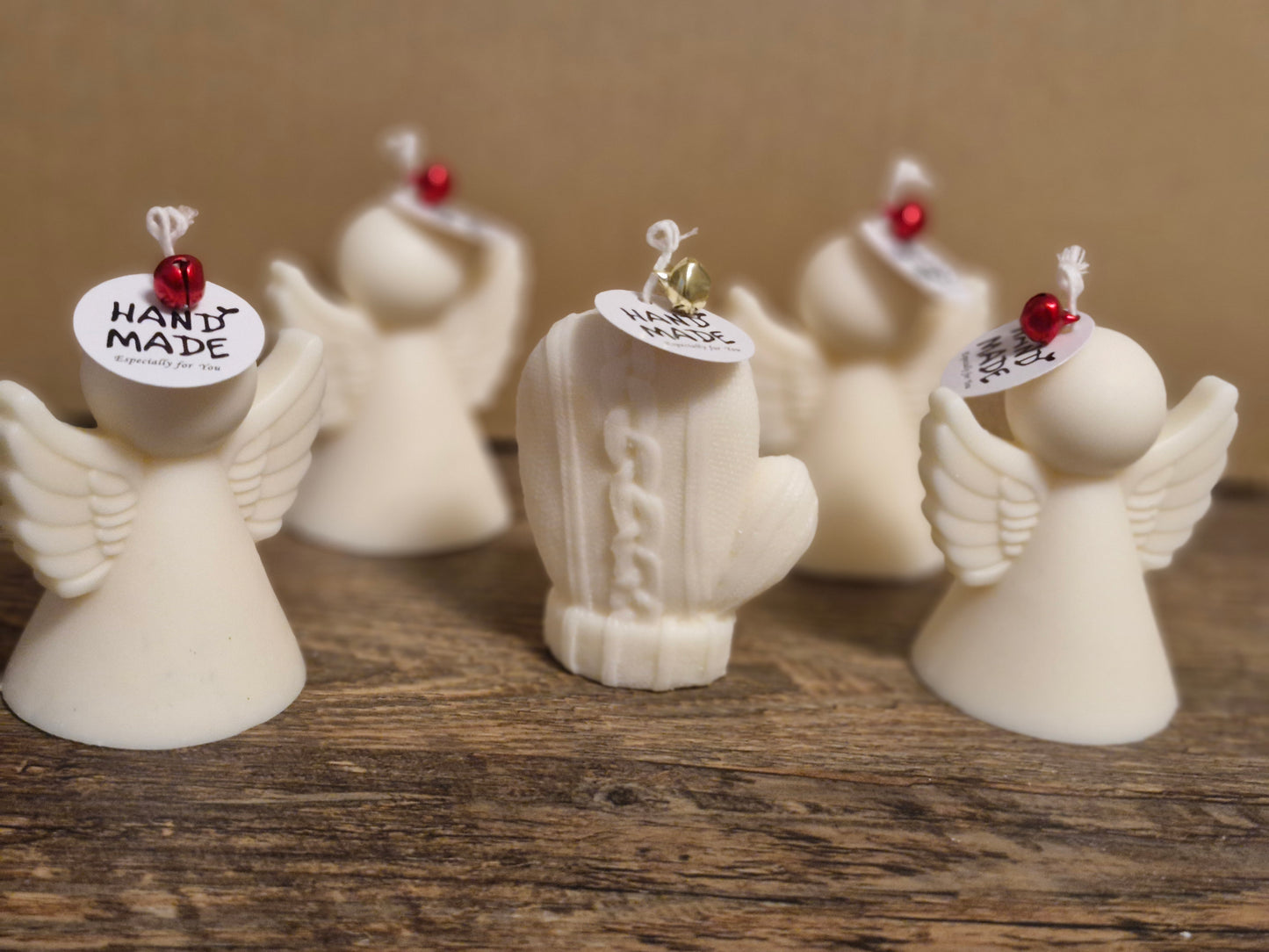 Engel und Handschuh Kerze im schlichten Design